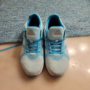 Turquoise adidas tennis shoes. Super cute, I ordered wrong size, way too small.